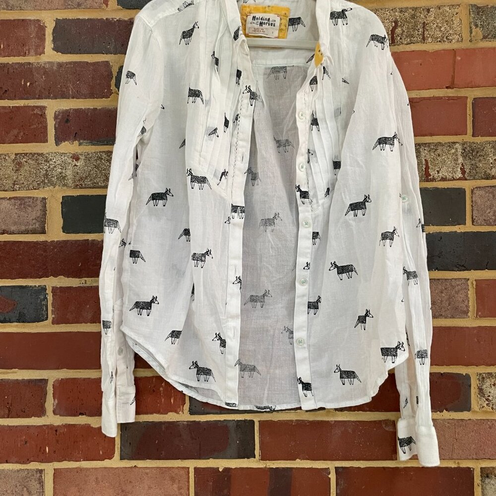 anthropologie holding horses